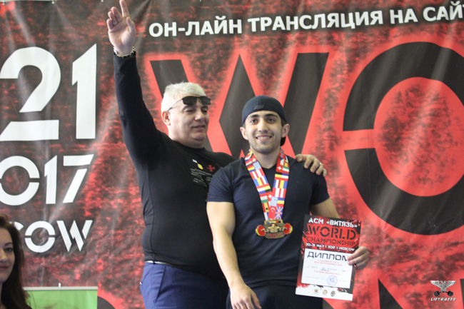 На пьедестале с тренером А. Алхазовым